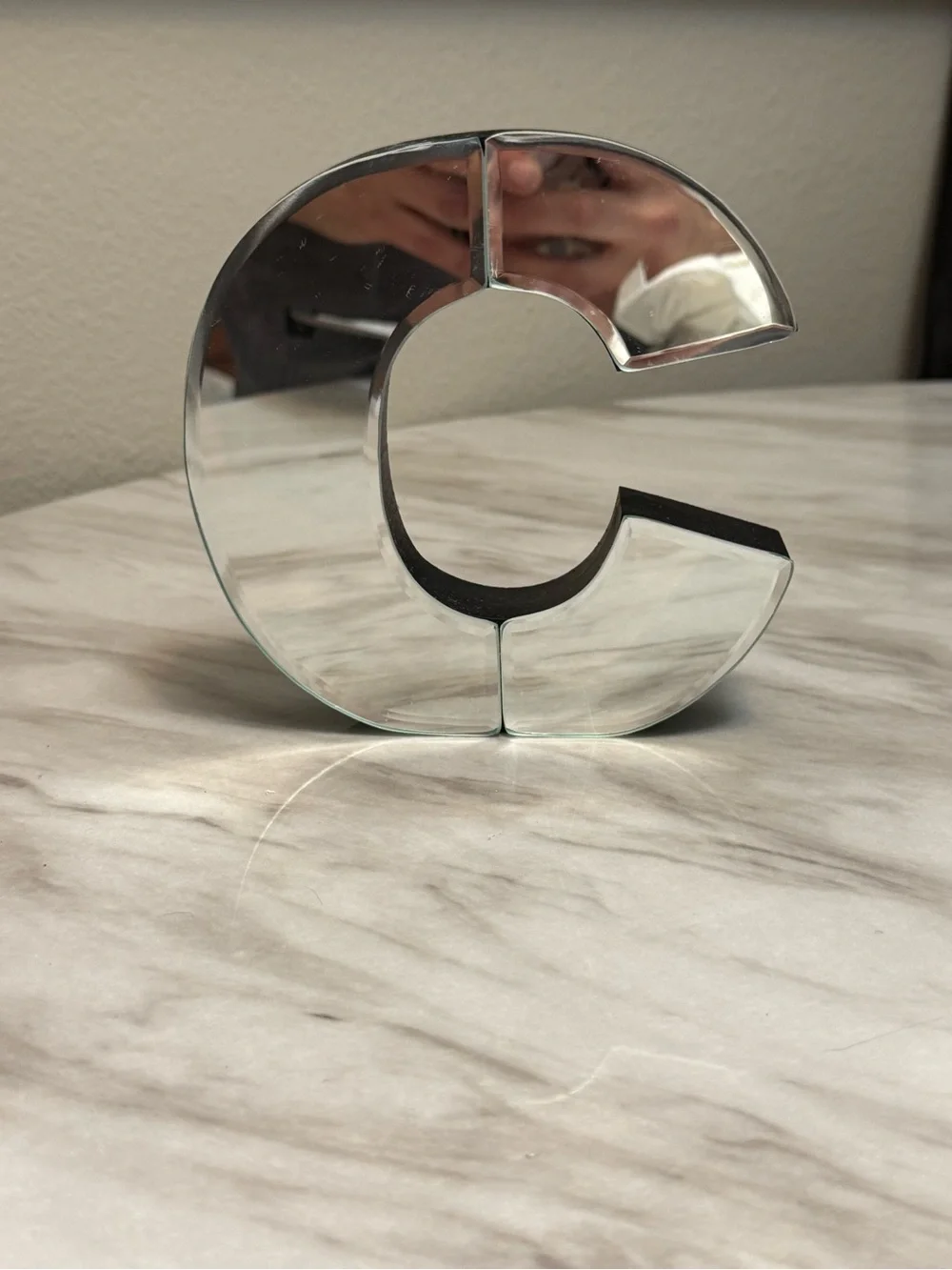 Mirrored letter C